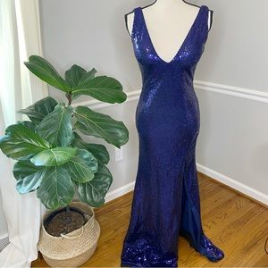 Trumpet/Mermaid Sleeveless V-neck Court Train Ruffles Sequins Dresses